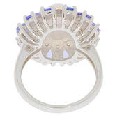 Back view of a Blue Opal Sterling Silver Ring showcasing intricate design and sparkling accent stones.